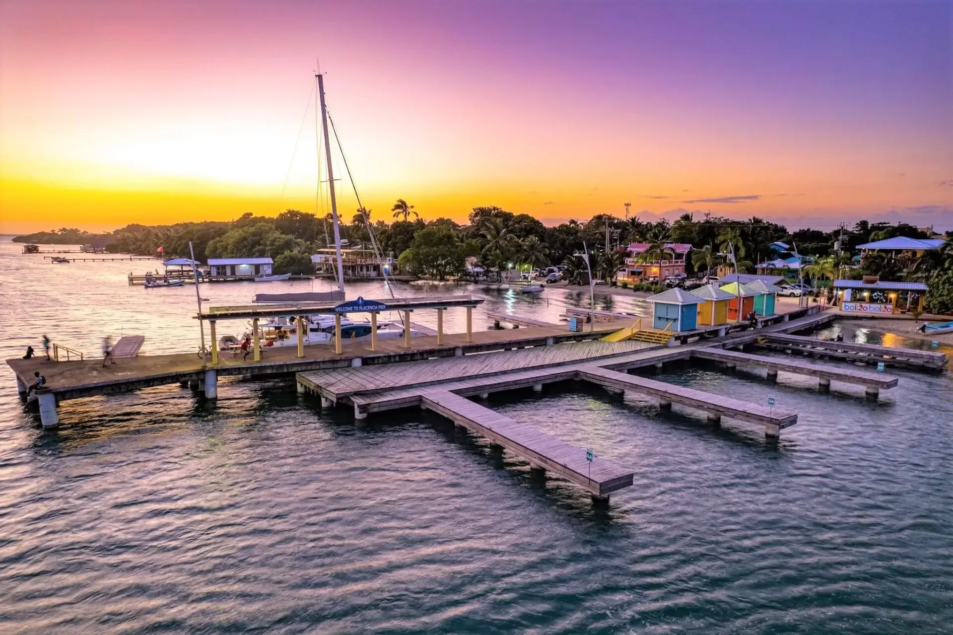 Open offshore Caribbean water south of Placencia at dusk — the productive and underworked billfishing grounds of southern Belize